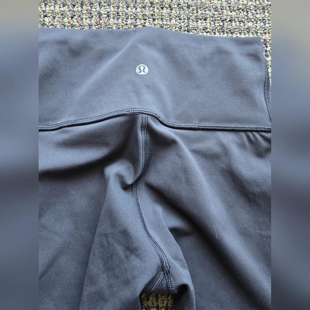 Lululemon Athletica Black Capris with Mesh Accents